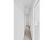Walk-in closet with shelving and a peek at the ensuite bathroom at 1256 Redondo Way, Wesley Chapel, FL 33543