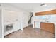 Bright kitchen featuring white appliances, light wood cabinets and a sink under the window at 1256 Redondo Way, Wesley Chapel, FL 33543