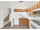 Kitchen featuring stainless steel appliances and a double sink below the sight line window at 1256 Redondo Way, Wesley Chapel, FL 33543