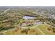 Aerial view of the community lake, surrounded by walking paths, park and ample parking at 1621 S Keene Rd, Clearwater, FL 33756