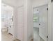 Hallway showing access to both bathroom and bedroom at 1621 S Keene Rd, Clearwater, FL 33756