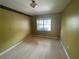 Bedroom with laminate flooring and a window view of the screened in patio at 16905 Falconridge Rd, Lithia, FL 33547