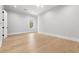 Bedroom featuring hardwood floors, recessed lighting, and white trim at 216 N Hesperides St, Tampa, FL 33609