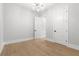 Bedroom featuring hardwood floors, recessed lighting, and white doors at 216 N Hesperides St, Tampa, FL 33609