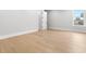 Bedroom with white doors and trim and light-colored wood floors at 216 N Hesperides St, Tampa, FL 33609