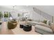 Stylish living room with open layout to the kitchen and dining area at 216 N Hesperides St, Tampa, FL 33609