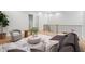 Well-appointed living room featuring comfortable seating, modern decor, and hardwood floors at 216 N Hesperides St, Tampa, FL 33609