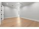 Bedroom featuring hardwood floors, a ceiling fan, and neutral color palette at 222 N Hesperides St, Tampa, FL 33609