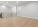 Bonus room area featuring hardwood floors and neutral color palette at 222 N Hesperides St, Tampa, FL 33609