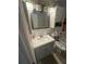 Bathroom features vanity with sink, mirror, and medicine cabinet at 2344 Tahitian Dr, Holiday, FL 34691