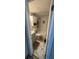 A bright bathroom with new tile features a shower and ample storage at 2344 Tahitian Dr, Holiday, FL 34691