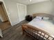 This comfortable bedroom features laminate floors and a closet at 2344 Tahitian Dr, Holiday, FL 34691