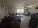 Bright living room featuring neutral tones and ample natural light at 2344 Tahitian Dr, Holiday, FL 34691