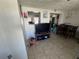 Open concept living room with a breakfast bar and tile flooring at 2344 Tahitian Dr, Holiday, FL 34691