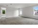 Bright and spacious bedroom with neutral walls and plush carpeting, offering a serene and inviting atmosphere at 2497 Orange Harvest Pl, Seffner, FL 33584