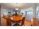 Dining area adjacent to a bright kitchen, ideal for casual meals and Gathering gatherings at 2720 Lancaster Dr, Sun City Center, FL 33573