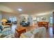 Spacious living room with a dining area, perfect for entertaining and gatherings at 2720 Lancaster Dr, Sun City Center, FL 33573