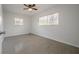 Bedroom featuring natural light, neutral walls, blinds and plush carpet at 2918 W Ellis Dr, Tampa, FL 33611