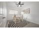 Home office featuring a black and white rug, modern desk, and comfortable seating at 2918 W Ellis Dr, Tampa, FL 33611