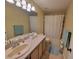 Bathroom with vanity, countertop, shower, bathtub, and tiled floor at 310 Kensington Lake Cir, Brandon, FL 33511