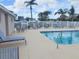 Relaxing pool area featuring chaise lounges, tables, and a refreshing pool for residents at 310 Kensington Lake Cir, Brandon, FL 33511