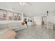 Open-concept living space with a seamless flow between the living room, kitchen, and dining area at 31386 Penny Surf Loop, Wesley Chapel, FL 33545