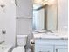 A bright bathroom features a tub/shower, undermount sink with quartz counters at 3215 W De Leon St # 6, Tampa, FL 33609