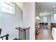 Hallway with staircase and a view of the dining and kitchen area at 3215 W De Leon St # 6, Tampa, FL 33609