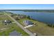 An aerial view featuring waterfront homes with views of a serene bay at 3319 Gulf City Rd, Ruskin, FL 33570