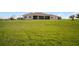 Expansive backyard featuring well-maintained lawns and large space at 3319 Gulf City Rd, Ruskin, FL 33570