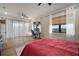 Large bedroom features windows with water views, wood flooring, and neutral walls at 3319 Gulf City Rd, Ruskin, FL 33570