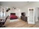 Bright and spacious bedroom features wood floors, large windows, and modern furniture at 3319 Gulf City Rd, Ruskin, FL 33570