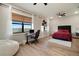 Spacious bedroom with large windows offering picturesque views, complete with modern furnishings at 3319 Gulf City Rd, Ruskin, FL 33570