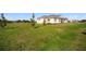 Attractive home on a vast, well-maintained lawn with scattered trees at 3319 Gulf City Rd, Ruskin, FL 33570