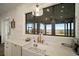 The sink in this kitchen boasts a stunning waterfront view from the large window at 3319 Gulf City Rd, Ruskin, FL 33570