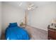 Spare bedroom with comfortable day bed, and neutral walls at 34714 Heavenly Ln, Dade City, FL 33525