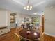 Formal dining room flows to living spaces, with an abundance of natural light at 34714 Heavenly Ln, Dade City, FL 33525