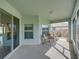 Spacious screened porch offering a seamless transition to outdoor living at 34714 Heavenly Ln, Dade City, FL 33525