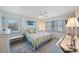 Inviting bedroom with ample natural light, a ceiling fan, and calm, peaceful decor at 387 S Mcmullen Booth Rd # 16, Clearwater, FL 33759