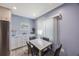 Well-lit dining area with white cabinets and a view of the window at 387 S Mcmullen Booth Rd # 16, Clearwater, FL 33759