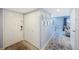 Hallway leading to living room and an entrance door with closet at 387 S Mcmullen Booth Rd # 16, Clearwater, FL 33759