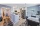 Kitchen with stainless steel appliances and a dining area with a view at 387 S Mcmullen Booth Rd # 16, Clearwater, FL 33759