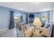 Comfortable living room with a sliding glass door leading to a patio at 387 S Mcmullen Booth Rd # 16, Clearwater, FL 33759