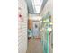 Charming home entryway decorated with beach-themed decor and storage at 39650 Us Highway 19 N # 1422, Tarpon Springs, FL 34689