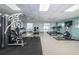 Community gym equipped with weight training machines, treadmills, and stationary bikes at 39650 Us Highway 19 N # 1422, Tarpon Springs, FL 34689