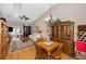 Bright and open living room with a dining space, wood floors and lots of light at 39650 Us Highway 19 N # 1422, Tarpon Springs, FL 34689