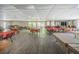 Spacious meeting room with lots of tables and chairs ready for activities and get-togethers at 39650 Us Highway 19 N # 1422, Tarpon Springs, FL 34689