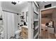 Charming bathroom featuring a tub with subway tile surround, modern vanity, and patterned tile floor at 4118 Ramona Dr, Spring Hill, FL 34606