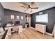 Inviting bedroom featuring hardwood floors, a ceiling fan, and a closet at 4118 Ramona Dr, Spring Hill, FL 34606