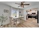 Charming dining area with wood-look floors and a glimpse into the kitchen, creating an inviting atmosphere at 4118 Ramona Dr, Spring Hill, FL 34606
